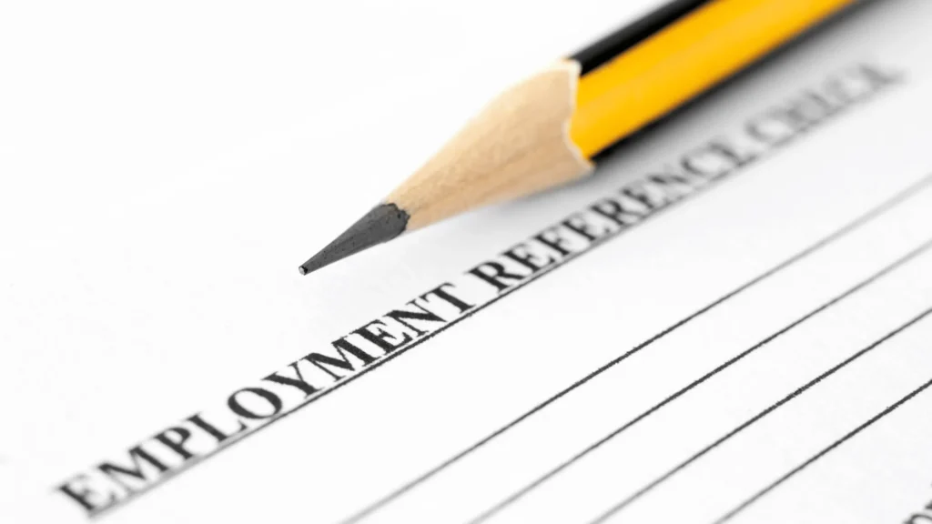 Image of paper and pencil showing employment reference checks page